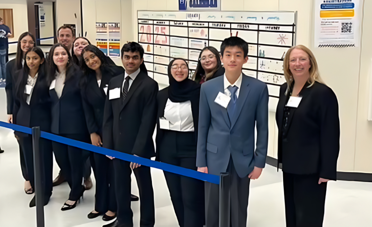 The Academic Decathlon team poses for a group photo. The team was attending their regional competition.